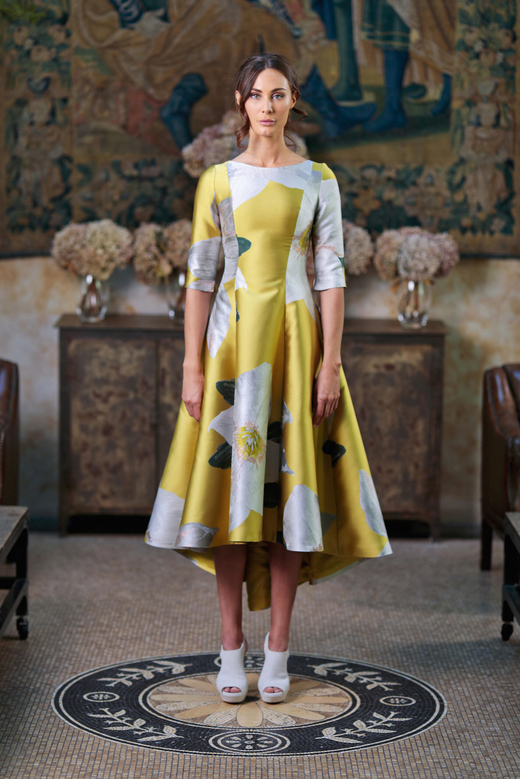 image of a yellow and white wedding guest dress
