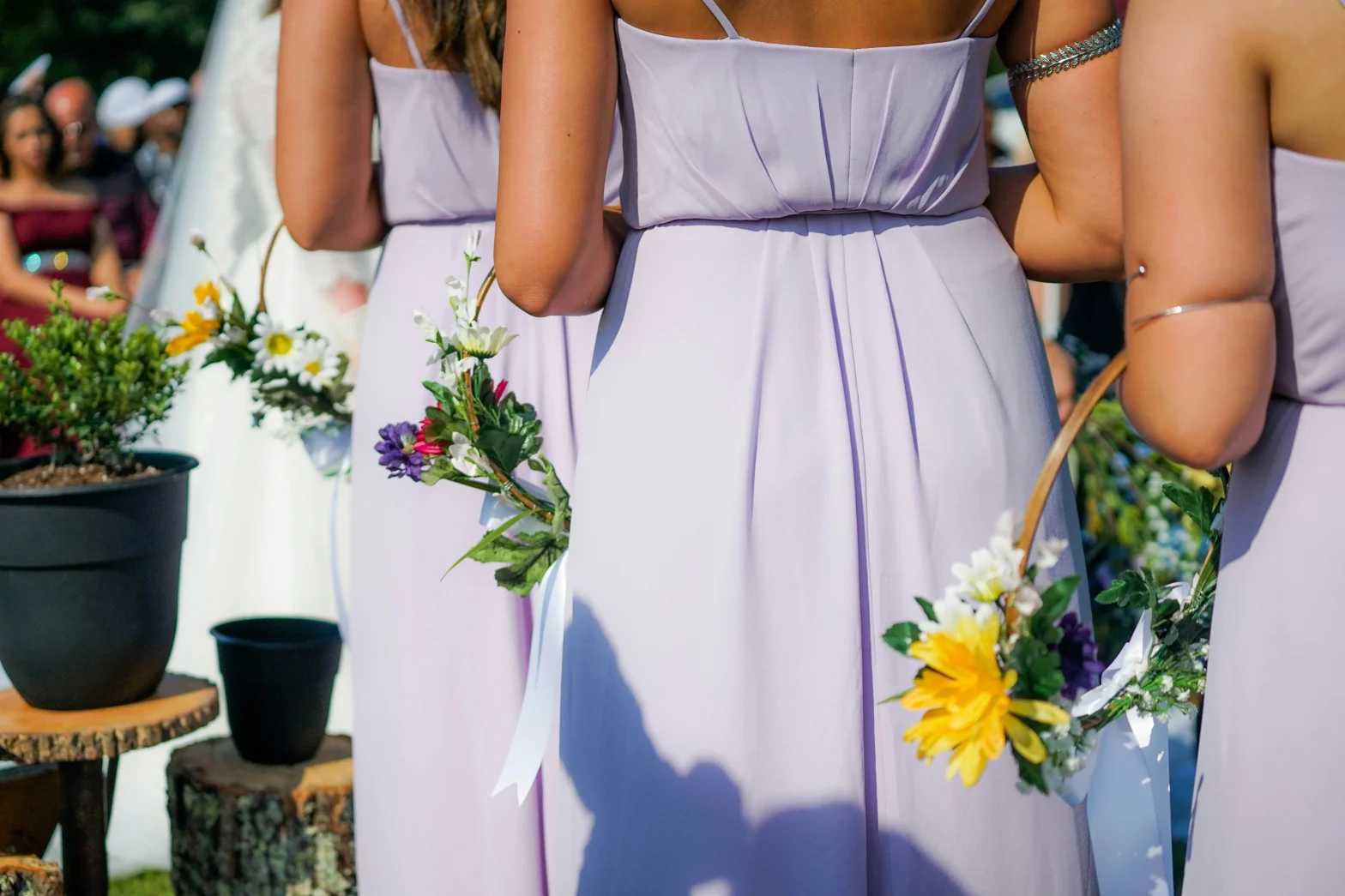 bridesmaids in Northampton in blue dresses lined up behind eachother